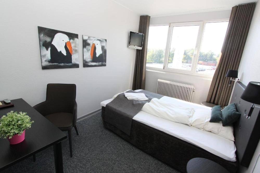 Banegaardshotellet Vojens Esterno foto